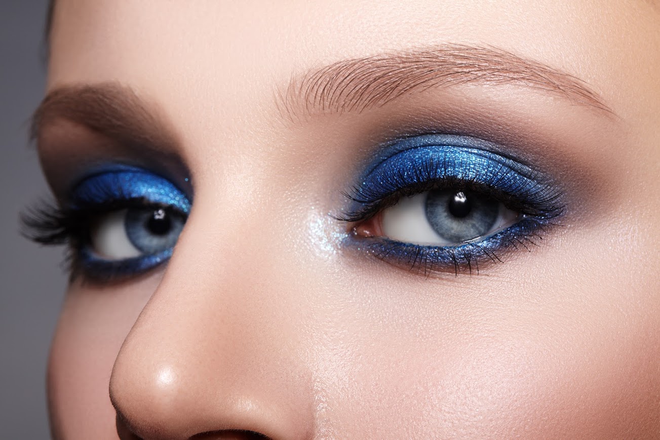 A person with blue eyeshadows