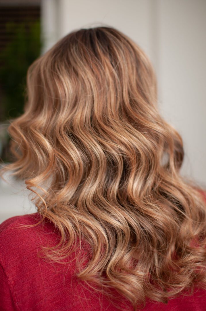 A person with a balayage hair