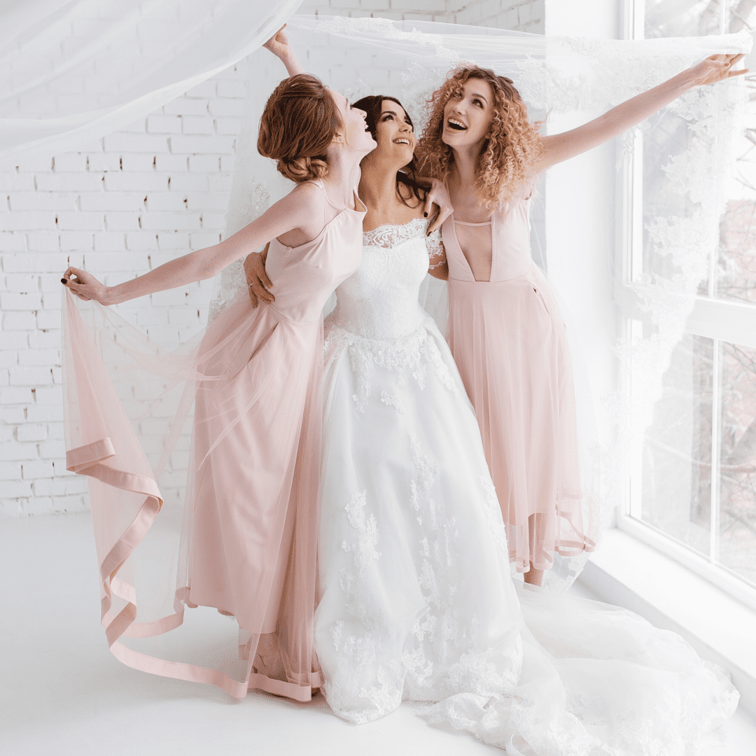 Three people wearing dreamy gowns